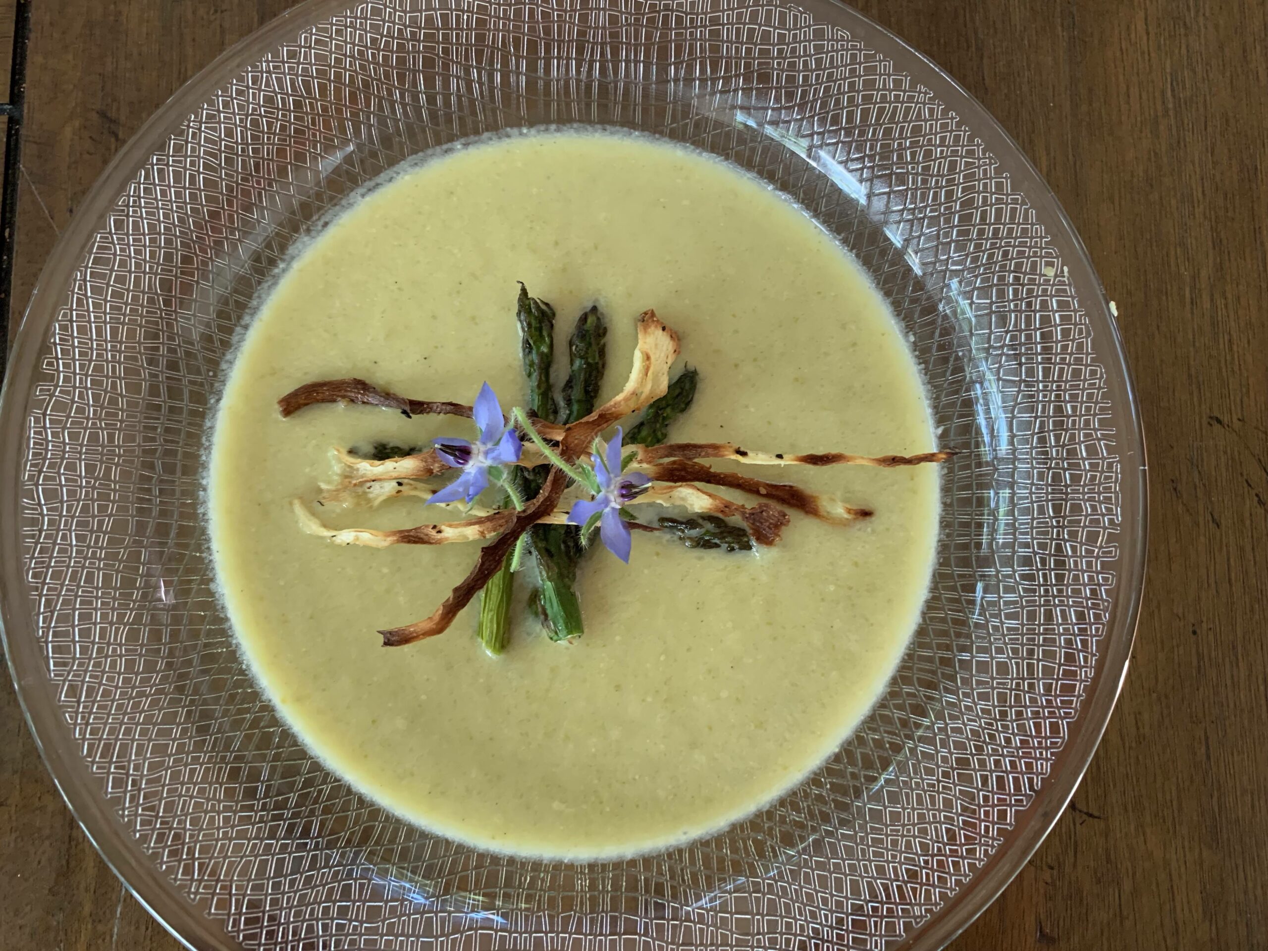 Asparagus Cream Soup with Parnsinps and Borage Flower